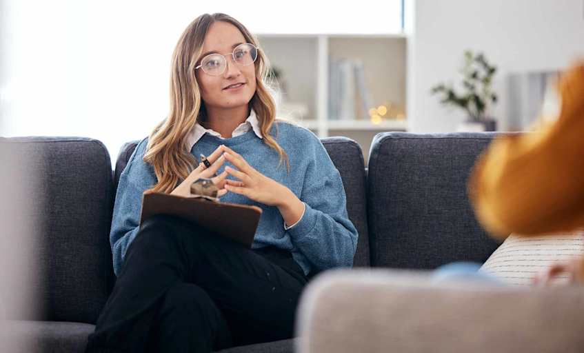 Behavioral psychologist listening to patient