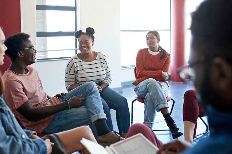 Group of students talking to school psychologist